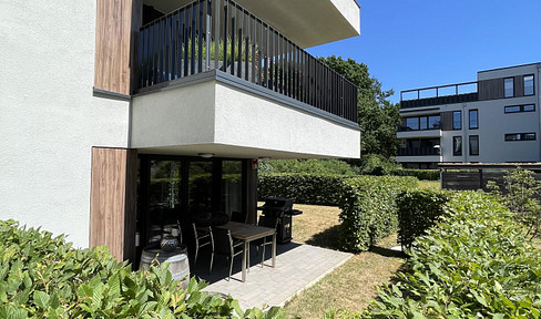Modern, 4-room apartment including 2 parking spaces in an underground garage.