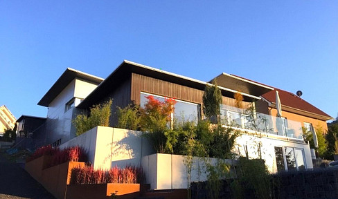 Architect-designed dream home with panoramic views.