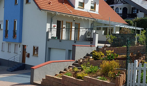 Semi-detached house, solid construction, with garden.