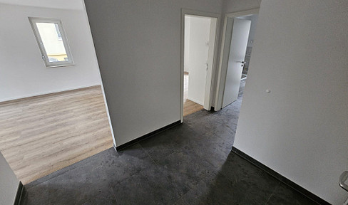Modern, newly built 2-room apartment with a garden and fitted kitchen – Premium living comfort in Müllrose.