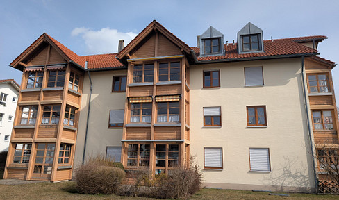 Bright and spacious 2-room apartment with a lovely veranda, a large cellar, and an attic space.