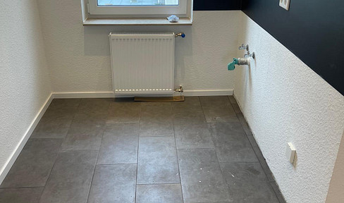 Completely renovated 2-room apartment in a central location.