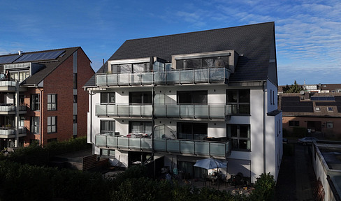 Schöne 3 Zimmerwohnung mit großer Süd-Terrasse und Garten