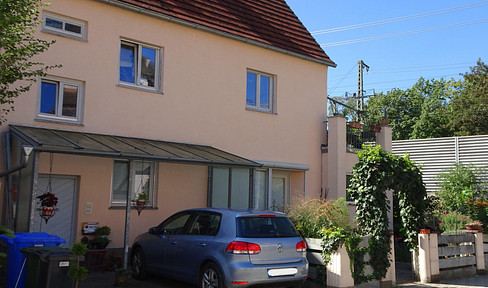 Semi-detached house with garden.