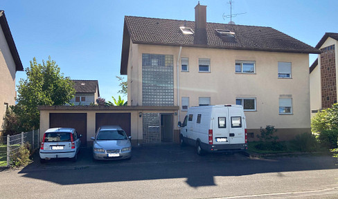 Multi-family house with a charming garden.