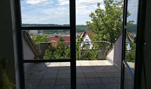 Charming, light-filled 3-room maisonette apartment with a large balcony and 2 parking spaces.