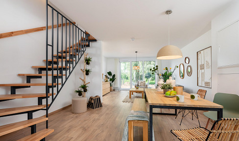 Exclusive, newly built terraced house (KfW 40 QNG standard) featuring a photovoltaic system, garden, and a modern fitted kitchen.