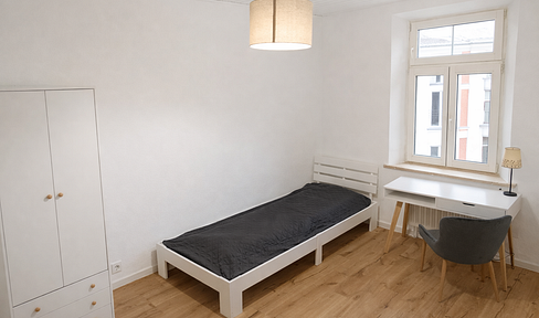 Furnished rooms available in a shared apartment, centrally located in the city.