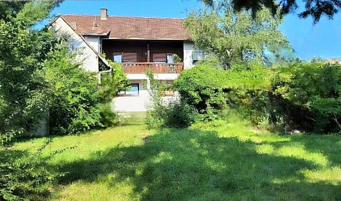House with a huge, dreamlike garden, perfect for self-sufficiency, hobbies, and animals, total area 1285 square meters.