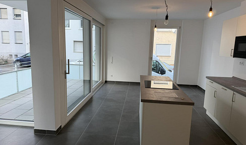 Modern, newly built 2-room apartment with a terrace, fitted kitchen, and underground parking space in Heilbronn.