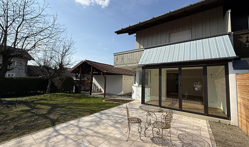 Modern townhouse in Grassau, with mountain views and close to a golf course.