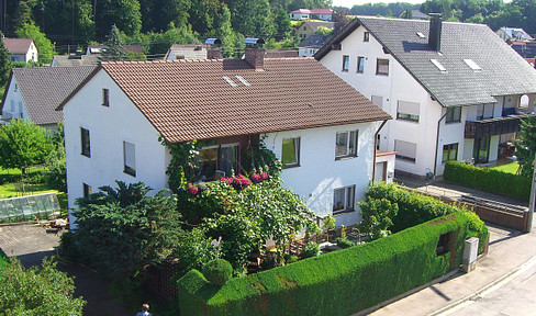 Two-family house in Regensburg with potential for expansion.