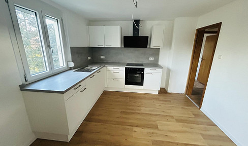 High up, very close – a bright, two-room apartment in a quiet location.