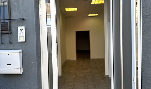 Warehouse with office space and parking.