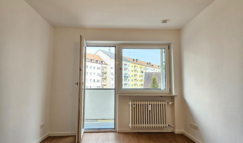 Small, one-room apartment with a balcony.
