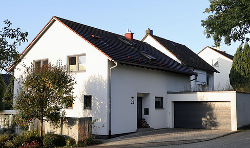 Modern single-family home in a quiet residential area.