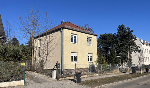 Detached house with a large garden.
