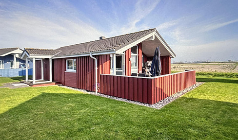 Charming holiday home directly on the North Sea dike.