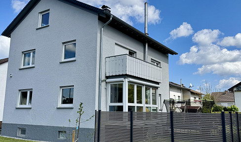 Spacious family home with potential to be converted into a two-family dwelling.