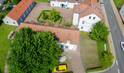 Highly profitable four-sided farm property near Hainer See, for sale, including rental apartments, holiday apartments, and commercial space.