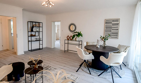 Newly renovated 4-room apartment with elevator and south-facing balcony – quiet location, close to the city center (41061).