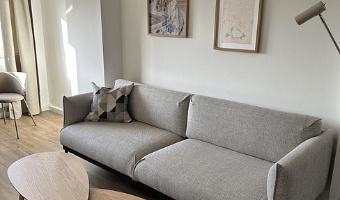 Furnished loft-style apartment near Augustusplatz – renovated, modern, and with elevator access.