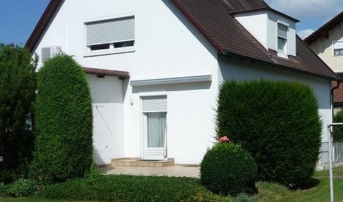 Detached house with a large garden and significant potential.