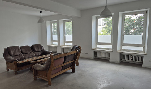 Loft-style apartments on Friedrich-Ebert-Street, approximately 100 square meters, with a meeting and co-working space, located in the Asian district of the city center (CBD).