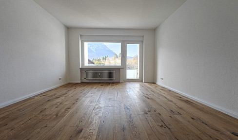 Renovierte - 4 Zimmer Wohnung mit Einbauküche, Loggia, Tiefgarage & grandiosem Bergblick