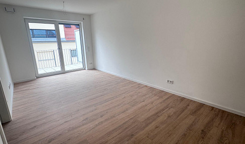 Ideally designed 2-room apartment with a rooftop terrace in a new building.