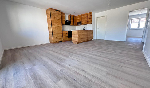Lichtdurchflutete 3-Zimmer Wohnung mit Einbauküche und Balkon! ERSTBEZUG
