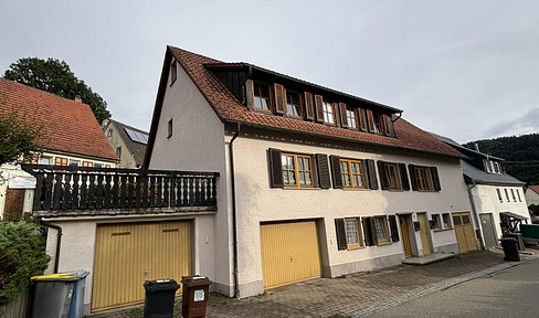 Two-family house with a barn and potential for expansion in Reichenbach a. H. - renovated, well-maintained, and currently rented.