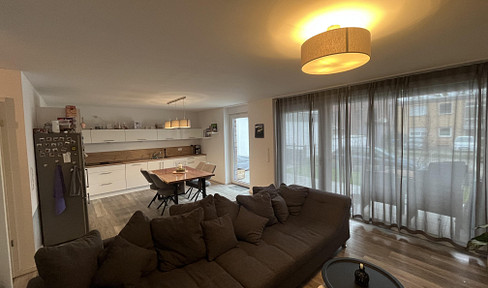 Modern 3-room ground-floor apartment (built in 2022) with garden and terrace – KfW 55 standard, parking space.