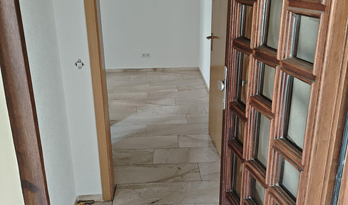 2,5-Zimmer-Wohnung inkl. TG-Stellplatz in zentraler Lage