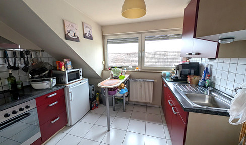 Ohne Provision - Ansprechende DG-Wohnung mit Balkon, Stellplatz & Tageslichtbad