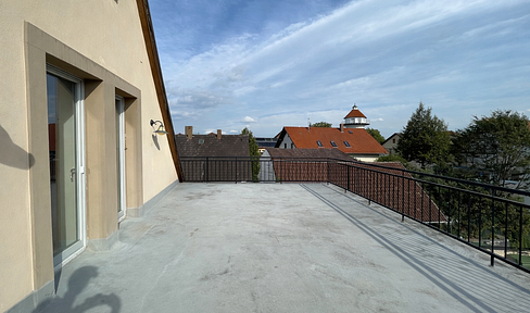 Besondere Maisonettewohnung mit exklusiver Dachterrasse