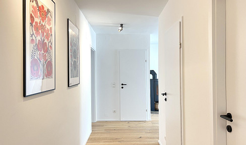Commission-free: Stylish 3-room apartment with a fireplace – brand new in the Fasanviertel district.
