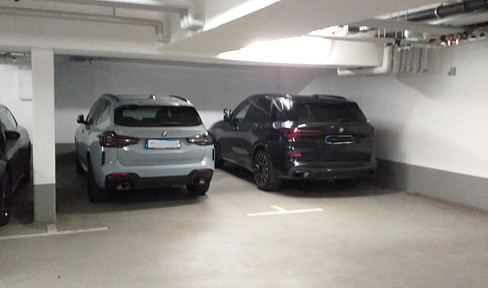 18 m² XL parking space in an underground garage, with registered ownership.