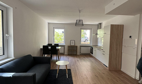 Lichtdurchflutete 2-Zimmer-Wohnung mit offener Wohnküche und modernem Flair