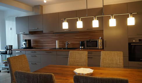 3-room apartment with barrier-free access, featuring a balcony, terrace, and loggia, located in Bad Camberg.