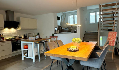 Modern townhouse on Lake Rheinau – 5.5 rooms, 2 terraces, garage, and top-quality features.