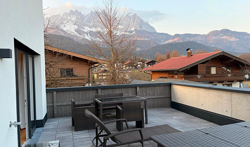 Modern 2-room apartment with terrace and garden in a quiet location – including parking space.