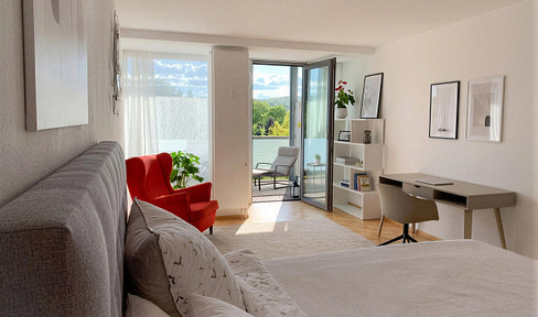 Investment property in Stuttgart-South: Rented 1.5-room apartment with balcony and underground parking.