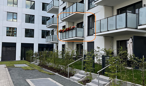 New construction – high-quality 2-room apartment, 51 square meters, with fitted kitchen, south-facing balcony, lake access, and a parking space in an underground garage.