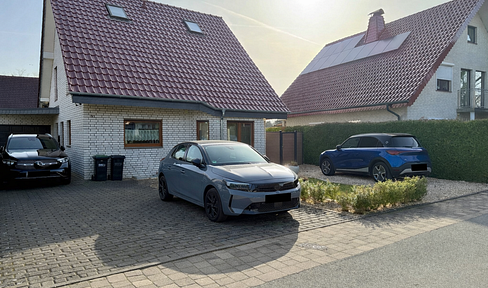 Modern family home with conservatory, party basement, and heat pump – quiet location in Herford.