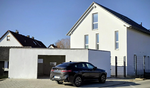 Luxury detached house with a separate apartment, garage, terrace, and a large garden.