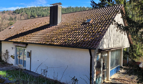 Charming single-family home in a beautiful hillside location.