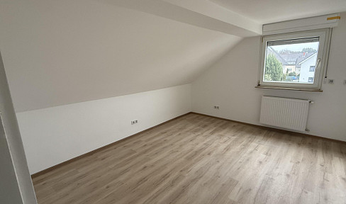 Bright 2.5-room attic apartment in Mühlheim am Main.