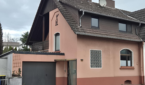 Detached house with no provisionary charges, featuring a garden, conservatory, and garage with a pit.
