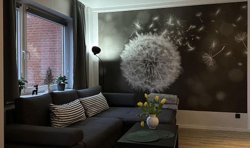 Modern, furnished 2-room apartment with a south-facing balcony.